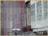 The large American Flag that hangs above Ground Zero with a sign just below it to thank and honor the HEROES for their sacrifices at this World Trade Center site